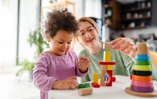 Parent and toddler playing