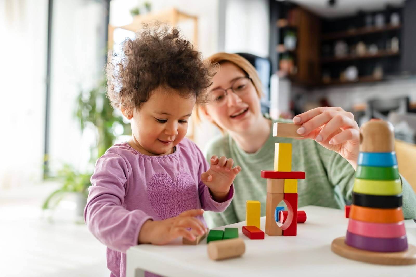 Parent and toddler playing